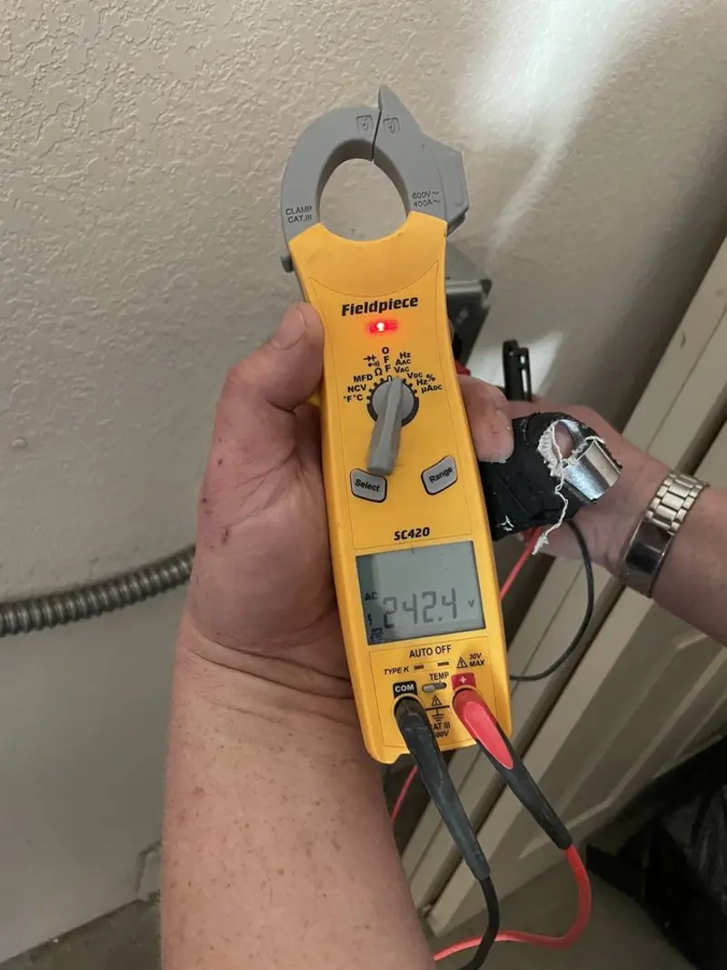 Voltage testing with clamp meter during Generator Installation in Paterson